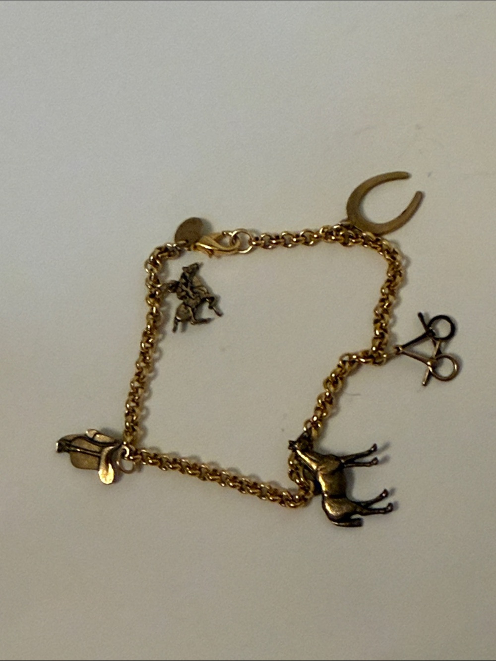 DISCOVERY OF CALIFORNIA BRACELET HORSE EQUESTRIAN THEME CHARMS 7.25” GOLD TONE